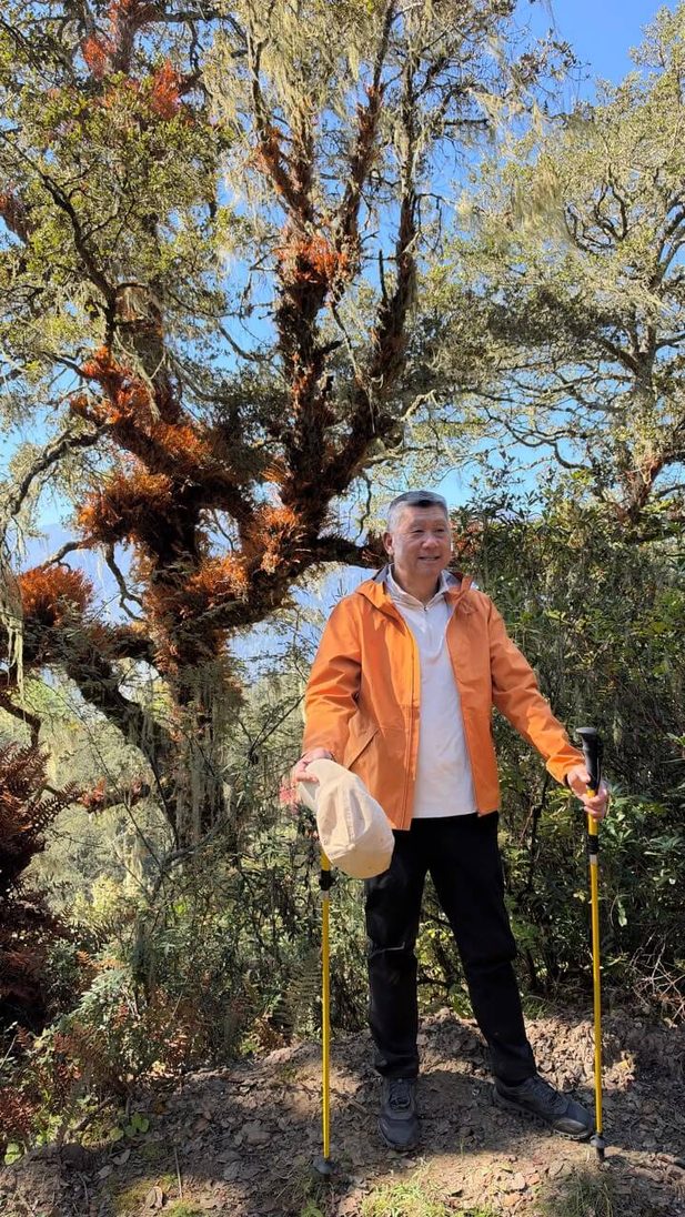 Man hiking with poles.
