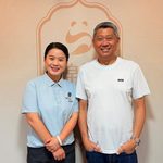 Two people posing together.