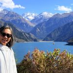 Woman at a mountain lake