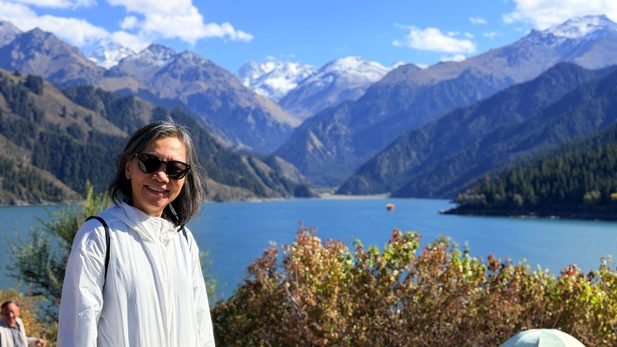 Woman at a mountain lake