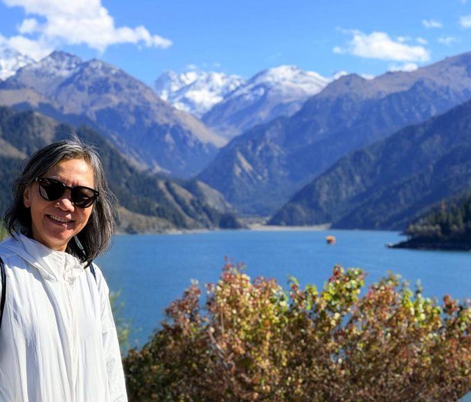 Woman at a mountain lake